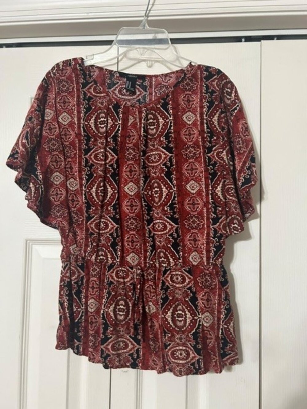 Burnt orange paisley peplum top (M)